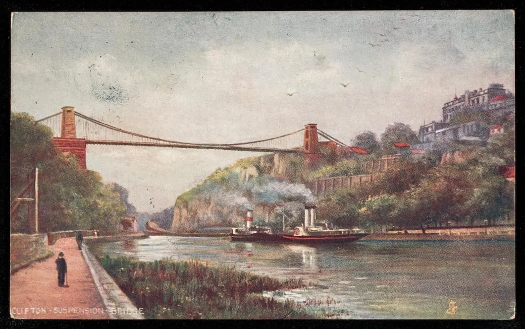a suspension bridge over a gorge and a river